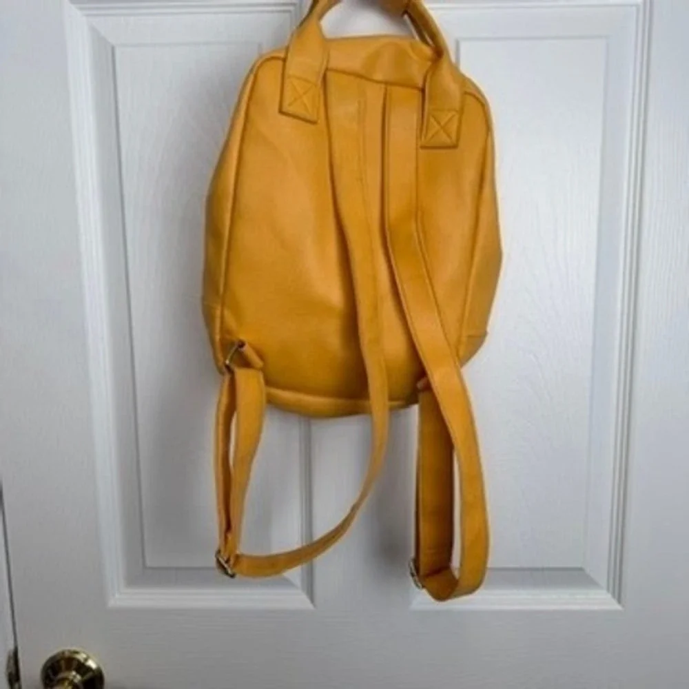 Yellow Faux Leather Small Backpack Pocket Front‎ Zip Closure Adjustable Straps
